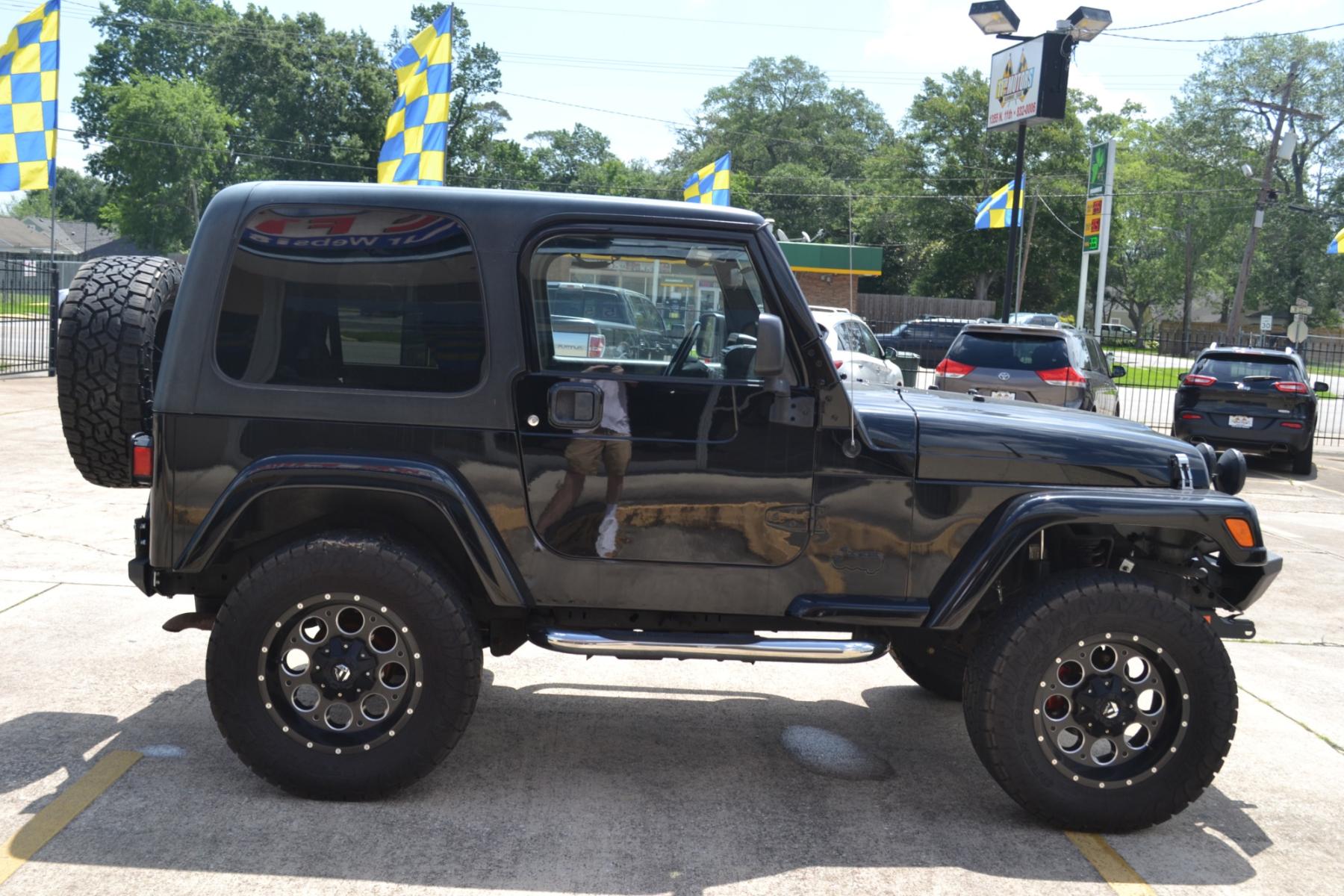 2003 BLACK /BLACK Jeep Wrangler X (1J4FA39S13P) with an 4.0L L6 OHV 12V engine, 4-Speed Automatic | 5-Speed Manual transmission, located at 1355 North 11th Street, Beaumont, 77702, (409) 832-0006, 30.094290, -94.130096 - Photo #5